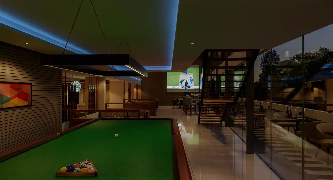 Hotel sports bar with a billiards table and a big screen, Trivandrum, interior by Rzianz Infrastructures