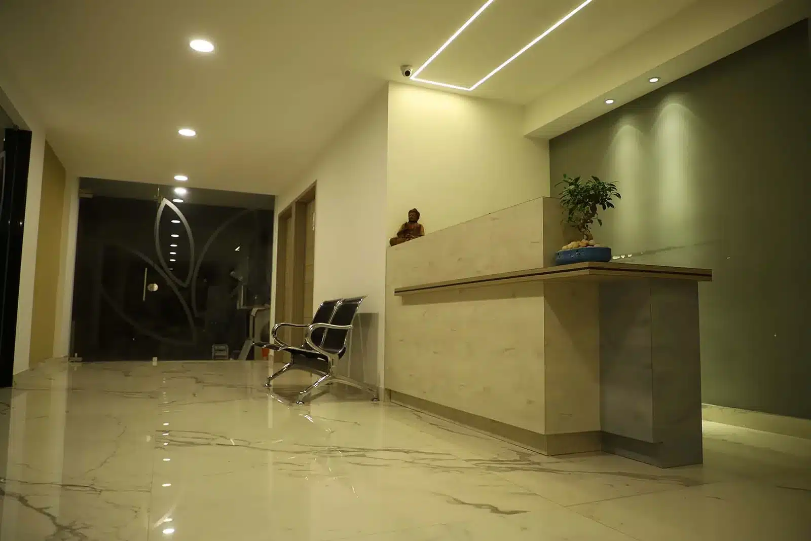 Clinic and medspa reception corridor interior, Kerala, designed by Rzianz Infrastructures